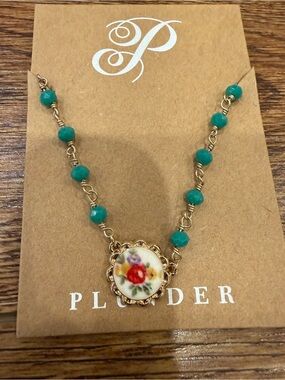 Plunder Teal Beaded Necklace with Floral Porcelain Medallion and Gold Accents
